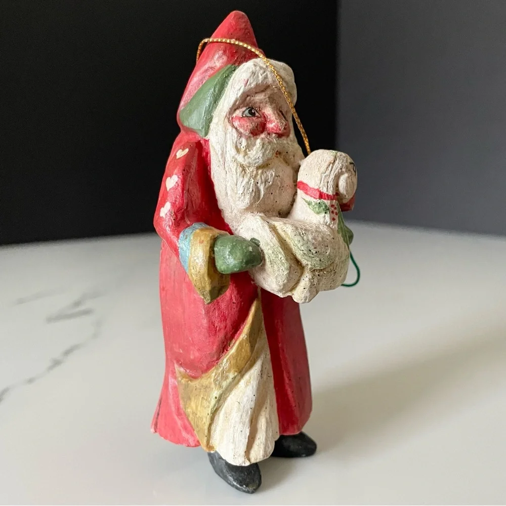 House Of Hatten santa holding